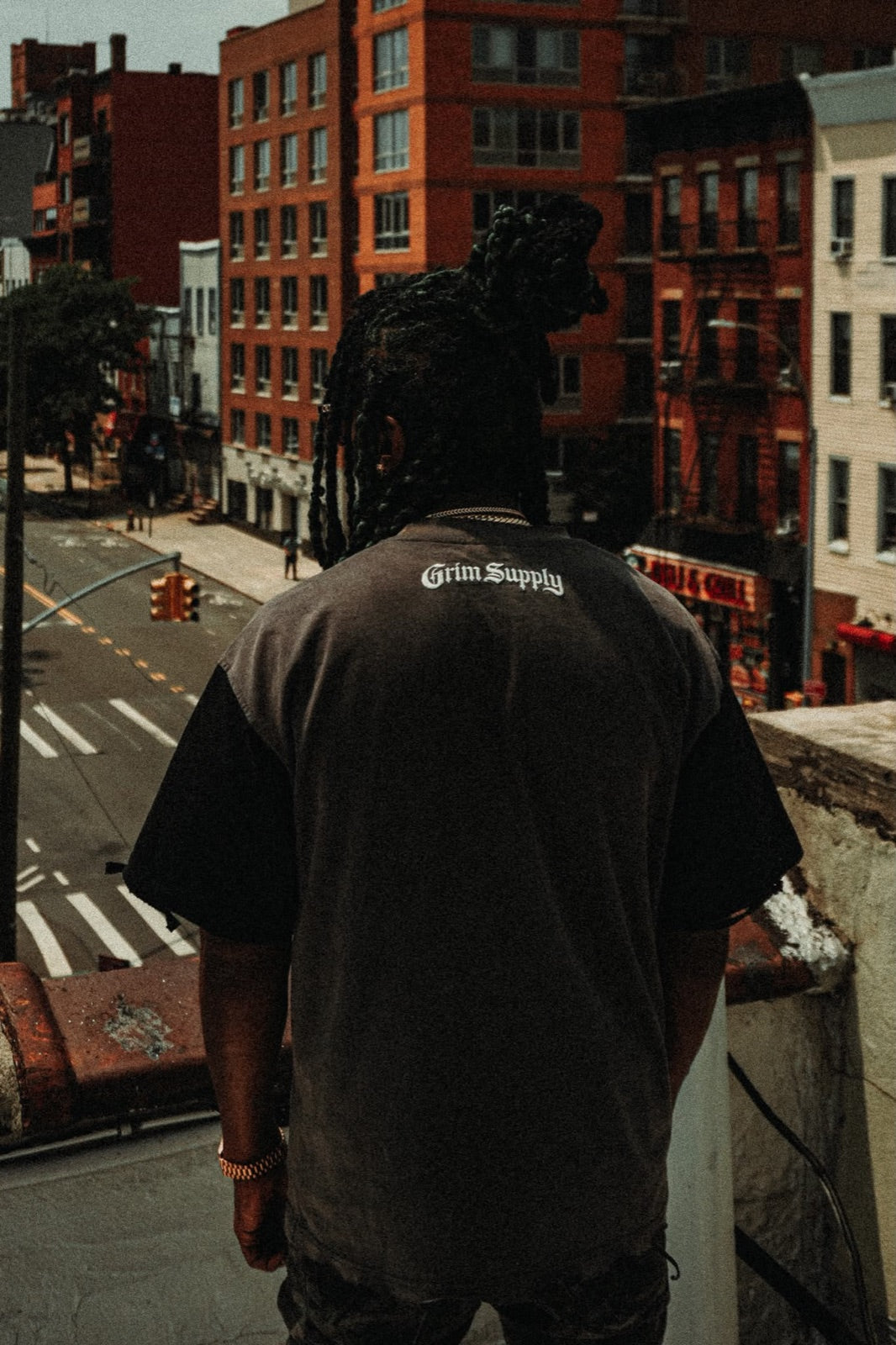 Grim Supply back print over the street
